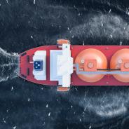 A gas tanker moves through a body of water.
