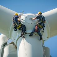 Engineers working on a wind turbine