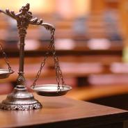 Unbalanced scales of justice.
