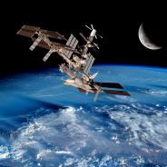 International Space Station with a background of Earth and the moon. 