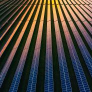 This photo shows an aerial view of solar panels.