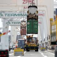 Trucks transport cargo across the U.S.-Mexico border