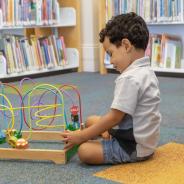 Child playing with toy