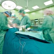 Surgeons operate on patient