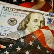 American flag envelopes stack of $100 bills