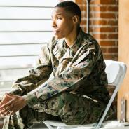 Solider sitting in folding chair
