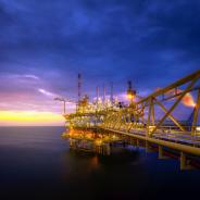 Offshore oil platform at sunrise/sunset