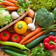 Table full of fresh vegetables and produce