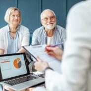 An elderly couple discusses their finances.