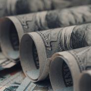 American US dollar bills rolled