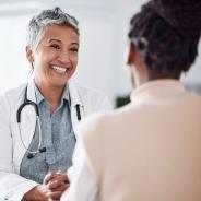 Doctor consulting a patient in meeting
