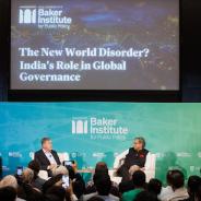 Sashi Tharoor seated on stage with David Satterfield at Baker Hall