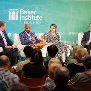 Political journalists Gromer Jeffers, Eleanor Dearman, and Jeff Wermund sitting onstage at Baker Hall with fellow Mark Jones 
