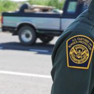 The U.S. Customs and Border Protection uniform patch of an agent standing on a road near an interior checkpoint in Southern Arizona