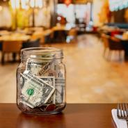 Tip jar in restaurant dining room