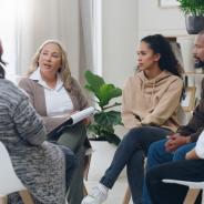 small circle of people discussing