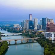 Colorado River and downtown city skyline of Austin at sunrise.