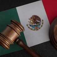 Judge gavel on flag of Mexico. Mexican legislation. 