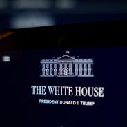 A smartphone screen displays the White House website and the official White House logo.
