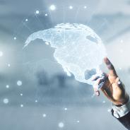Double exposure of businessman hand working with graphic America map on blurred office background.