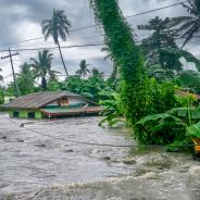 Rising water levels submerging a house as heavy monsoon rains cause major floods in Baco, Oriental Mindoro, Philippines on July 23, 2021.