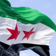 Syria flag waving in sky