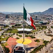 Panoramic view of Chihuahua with Mexican flag
