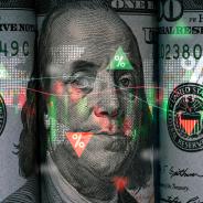 Benjamin Franklin face on USD dollar banknote with stock market chart and up down arrow for analysis investment.