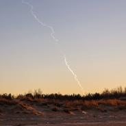 Missile trail in sky