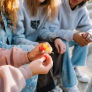 Children holding weed gummies