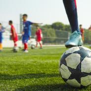 Child playing soccer