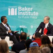 Paul Cherukuri and Rep. Brian Babin seated on stage at Baker Hall