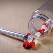 Pills and syringe