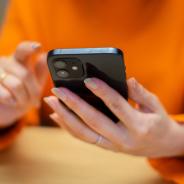 Person scrolling through cellphone