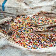 Shredded plastic garbage at waste recycling factory