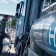 Man fueling truck with liquid hydrogen
