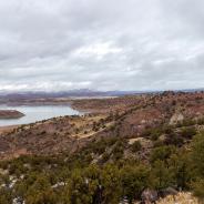 Red rocks around a reservoir