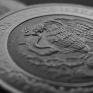 Coin of 5 Mexican pesos close-up. Peso of Mexico. Reverse of coin with coat of arms of country. 