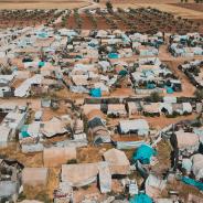 Aerial view of hundreds of tents inhabited by Syrian refugees for years due to the war that destroyed their homes.