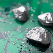 rare mineral rocks on green circuit board