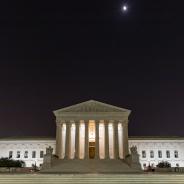U.S. Supreme Cout Building at night under the crescent moon, Washington D.C.