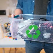 An electronic waste in recycling container close-up.
