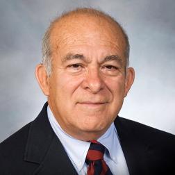 Headshot of Dagobert Brito.