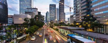Different forms of transportation on a busy street
