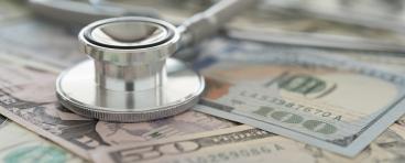 A stethoscope on American paper currency.