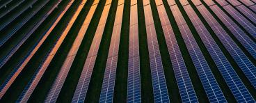 This photo shows an aerial view of solar panels.