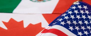 The flags of Canada, Mexico, and the U.S.