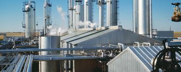 Gas powerplants with steam coming out.