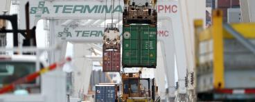 Trucks transport cargo across the U.S.-Mexico border