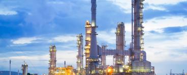 Oil refinery at sunset.